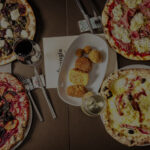 4 pizze e fritti gluten free sun un tavolo